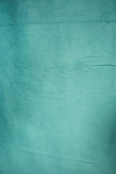 Ein einfarbiger, blauer Hintergrund in sanften Farbtönen.